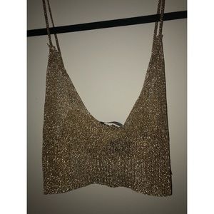 Sparkly gold crop top but more like a Bralette